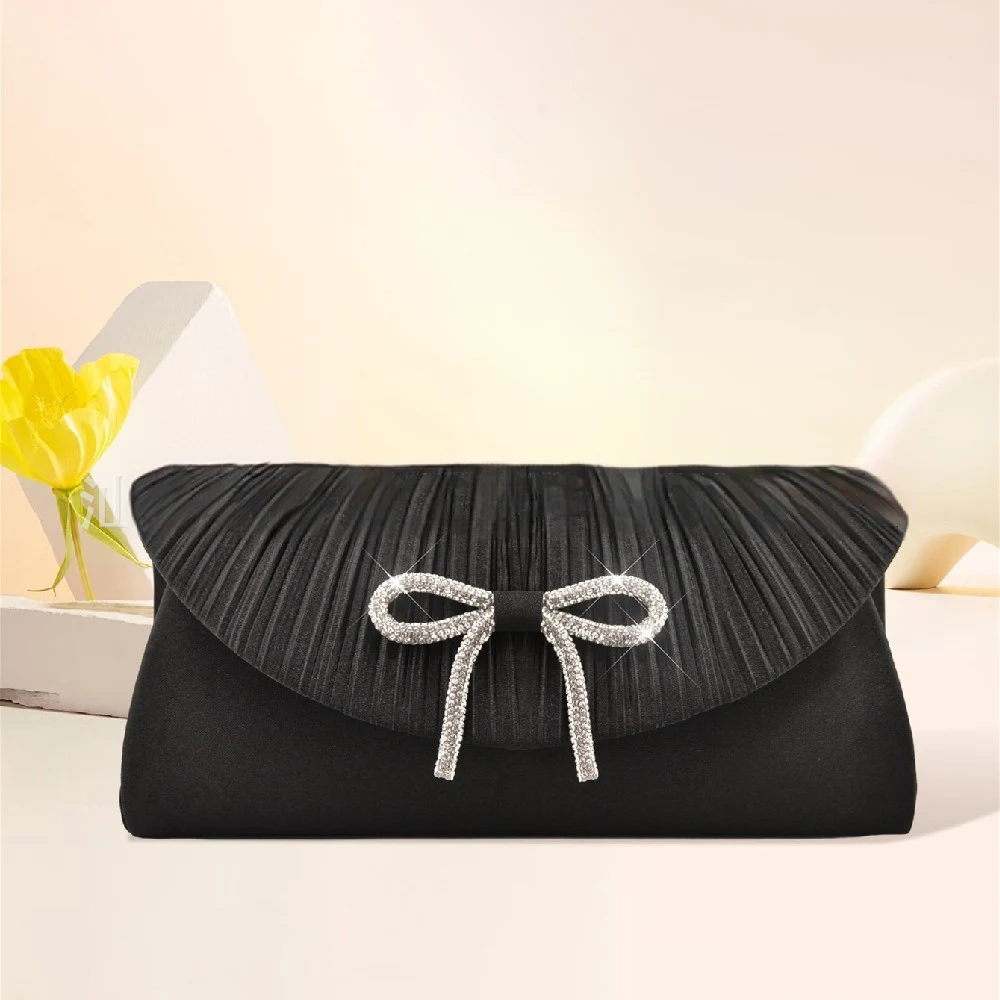 Bolsa de jantar feminina com laço. Elegância e charme para ocasiões especiais. Ideal para festas, casamentos e eventos. Detalhe de laço que encanta. — foto 4