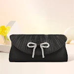 Bolsa de jantar feminina com laço. Elegância e charme para ocasiões especiais. Ideal para festas, casamentos e eventos. Detalhe de laço que encanta. — foto 4