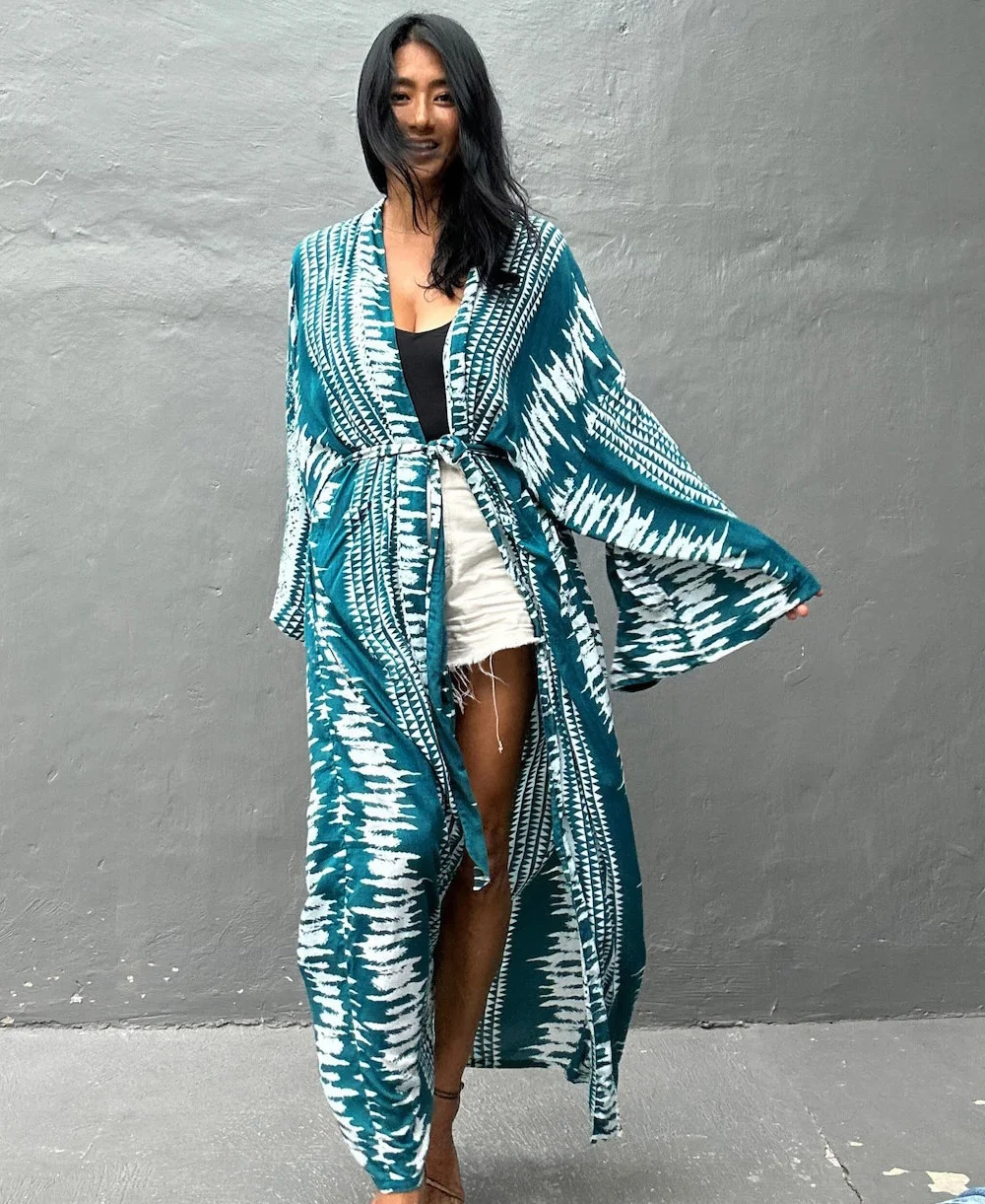 Blusa de biquíni solta e sexy com proteção solar estampada, perfeita para praia ou piscina, aproveite o sol com estilo e conforto! — foto 23