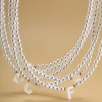 Colar de pérolas de imitação para mulheres Joia feminina elegante e acessível. Ideal para qualquer ocasião, complementando seu look com sofisticação e charme. — foto 6