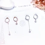 Pendientes asimétricos modernos para mujer, un accesorio elegante y único. Destaca con estos aretes con diseño asimétrico, ideales para cualquier ocasión. — foto 4