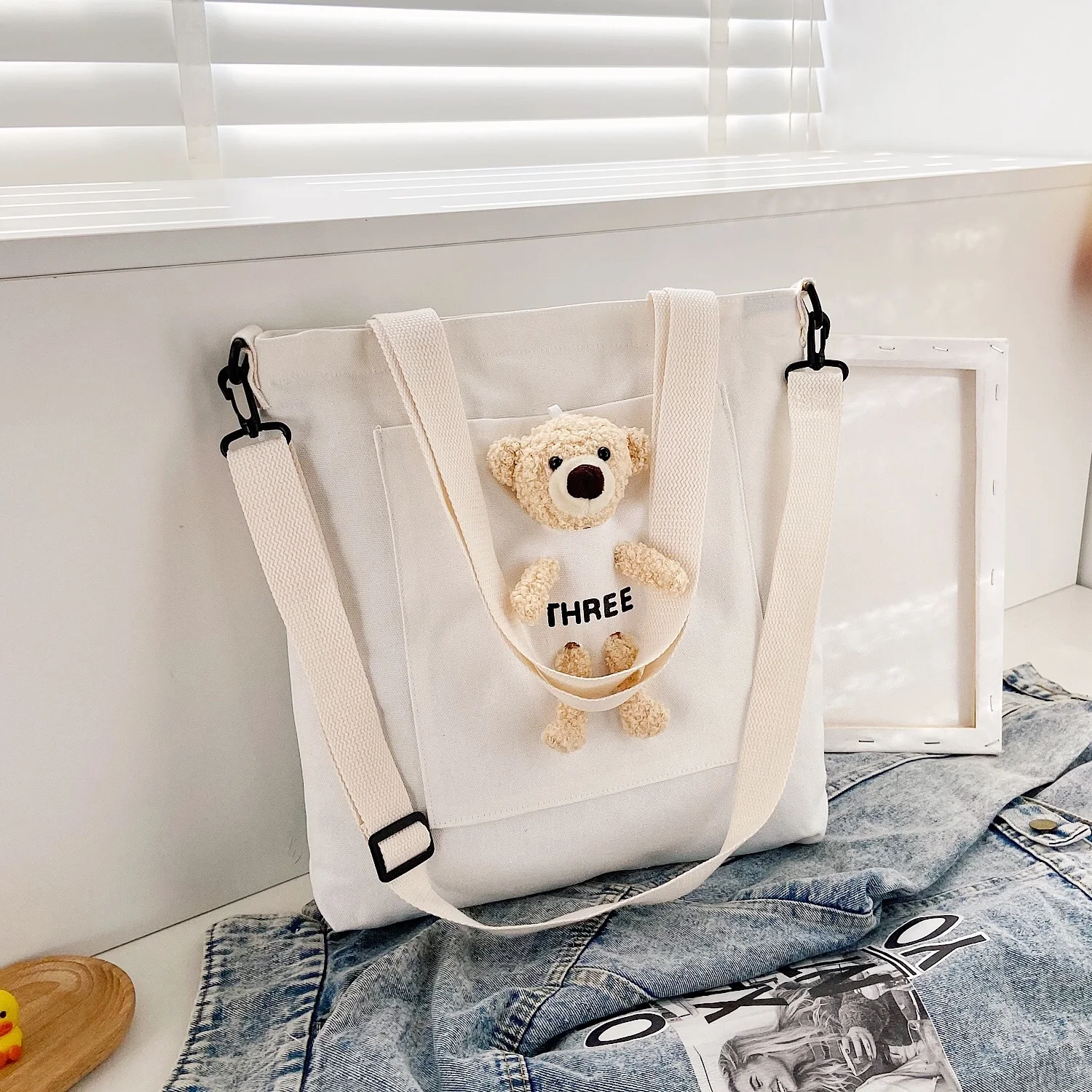 Bolsa Crossbody de Lona de Grande Capacidade. Leve tudo o que precisa com esta bolsa de ombro única, prática e espaçosa para o dia a dia. — foto 11