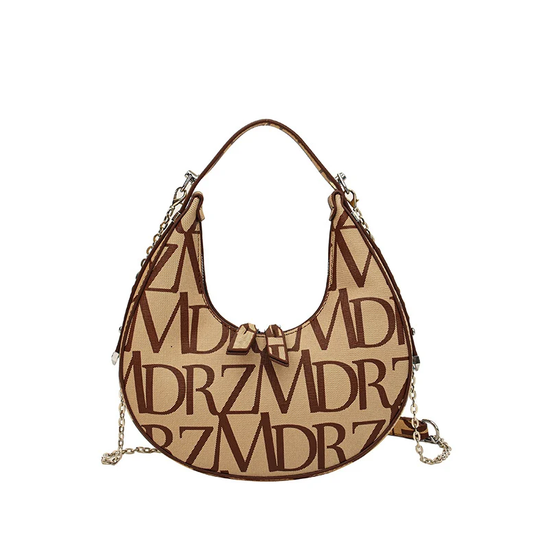 Bolsa de ombro e axila com estampa moderna, popular e estilosa. Perfeita para carregar seus itens essenciais com praticidade e elegância. — foto 28