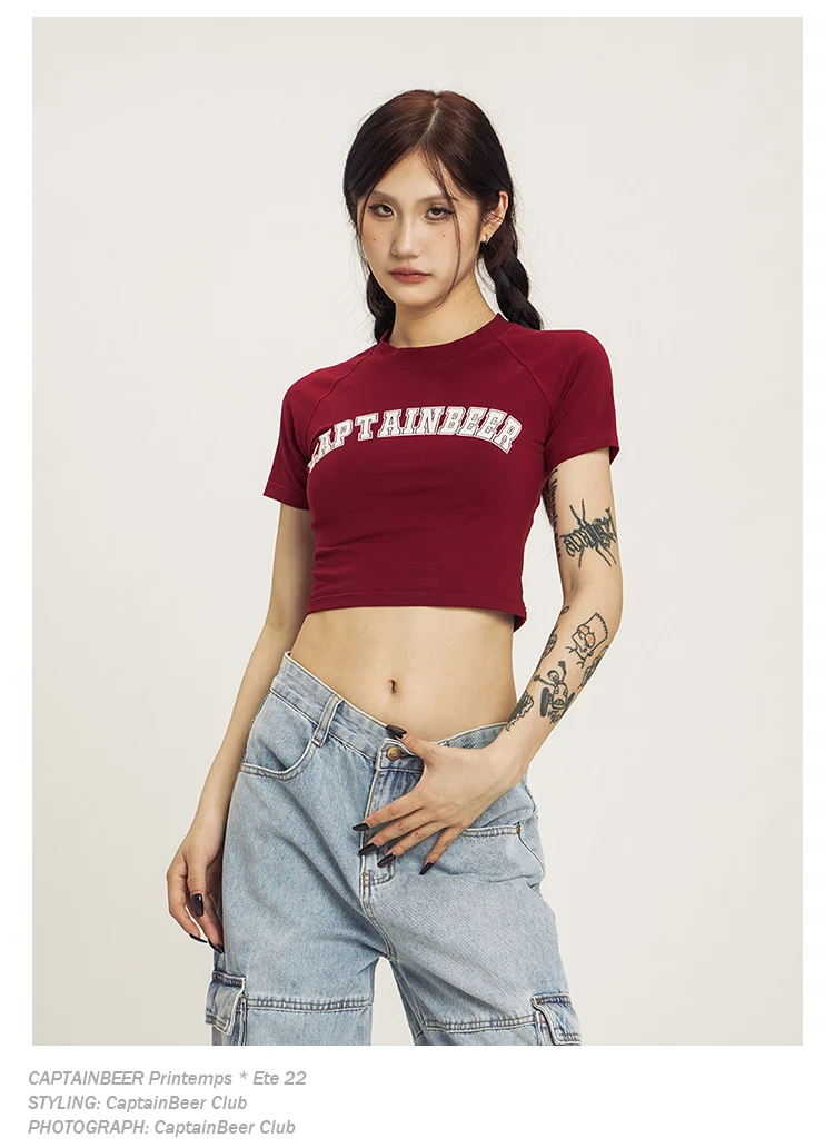Camiseta de verano para mujer, estilo retro americano, cuello redondo, manga corta, diseño de chica sexy, corte en el ombligo, moda. — foto 6