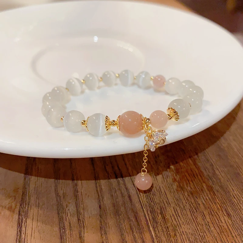 Pulseira fashion com pedra do sol olho de gato, um acessório elegante que adiciona brilho e energia, ideal para mulheres modernas. — foto 5