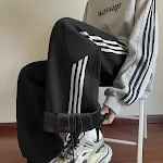 Trendy Sports Stripes Loose Casual Sweatpants offering ultimate comfort and style. Perfect for everyday wear, lounging, — photo 2