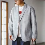 Blazer Listrado de Seersucker com Gola Plana para um Visual Refrescante e Elegante. Perfeito para o Verão e para diversas ocasiões. — foto 2