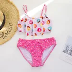 Maiô duas peças infantil TEMU da Amazon, com estampa de donut e cores contrastantes. Traje de banho divertido e moderno para meninas. — foto 3