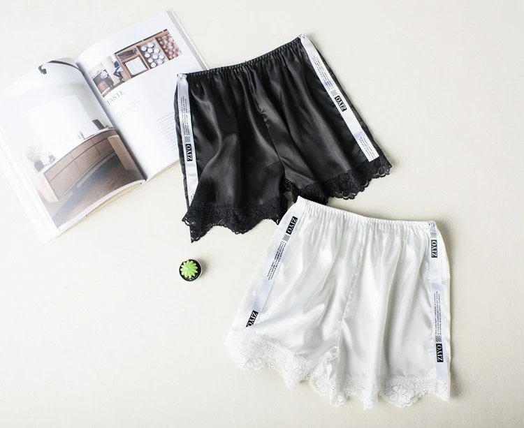 Title 11, Ladies anti-light safety pants with a white si...
