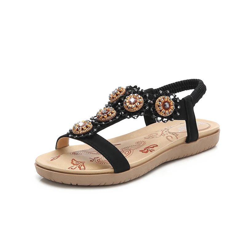 Sandálias femininas com bico redondo e flores de strass, proporcionando elegância e conforto para diversas ocasiões. — foto 12