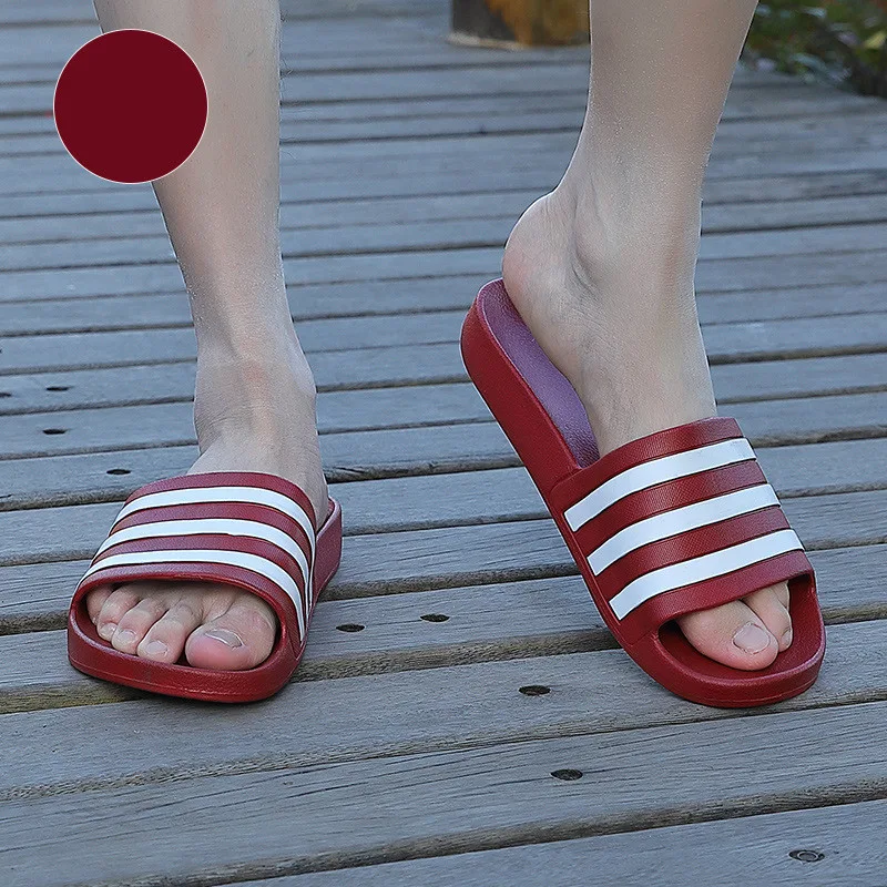 Non-slip home indoor bathroom slippers with soft striped design. Comfortable sandals and slippers providing safety and e — photo 3