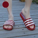 Non-slip home indoor bathroom slippers with soft striped design. Comfortable sandals and slippers providing safety and e — photo 3