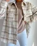Women's long coat with lapel and large pockets offers warmth and style. Perfect for everyday wear, this coat combines co — photo 14