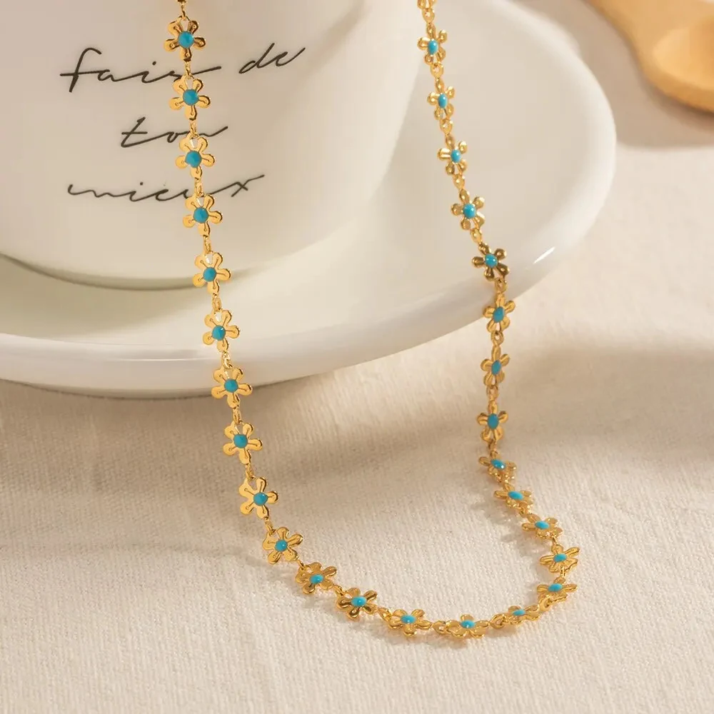 Collar de Aceite con Gota de Flores Azul Dorado Acero Titanio Un toque elegante y único para cualquier ocasión. — foto 6