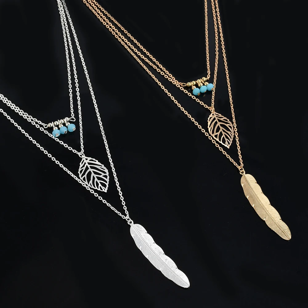 Colar feminino com pingente de várias camadas de penas, elegante e estiloso. Adicione um toque especial ao seu visual, ideal para diversas ocasiões. — foto 3