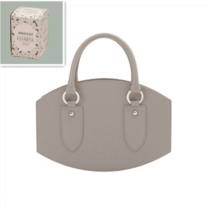 Bolsa de mão vintage com design irregular de um ombro. Charmosa, elegante e ideal para quem busca um toque de estilo único e atemporal. — foto 2