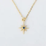 Colar com pingente estrela de oito pontas feminino, personalizado, banhado a cobre dourado e zircônias incrustadas. — foto 6