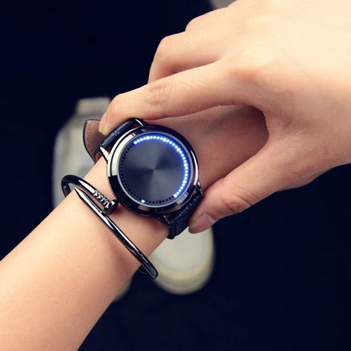Title 2, Electronic Dazzling Blue Light Watch. Experienc...