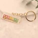 Chaveiro de energia removível com letras de desenho animado Carregue seu celular com estilo e diversão. Energia portátil personalizada, sem bateria fraca! — foto 9