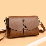 Bolsa transversal feminina retro, combinação perfeita para qualquer look. Carregue seus itens essenciais com estilo e praticidade no dia a dia. — foto 6
