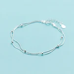 Pulseira Dupla Camada Simples e Elegante. Um acessório charmoso para o dia a dia, adicionando um toque de sofisticação ao seu visual. — foto 1