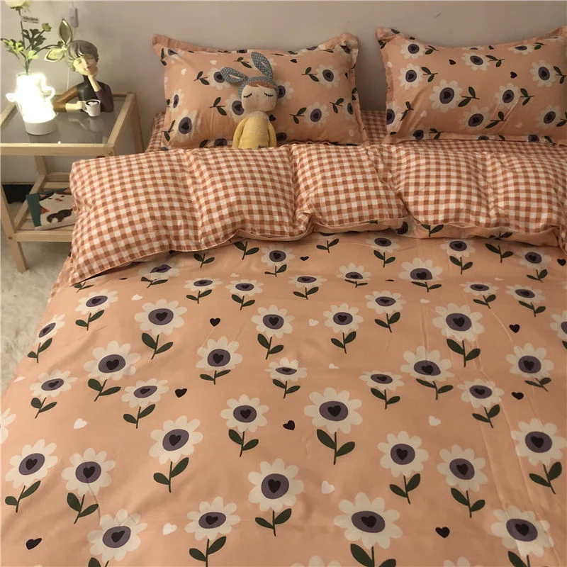 Jogo de cama de algodão lavado com desenho animado, capa de edredom e lençol vermelho, perfeito para noites aconchegantes e confortáveis. — foto 1