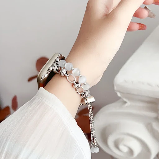 Title 6, Watch wristband with buckle, bead ornament, and...