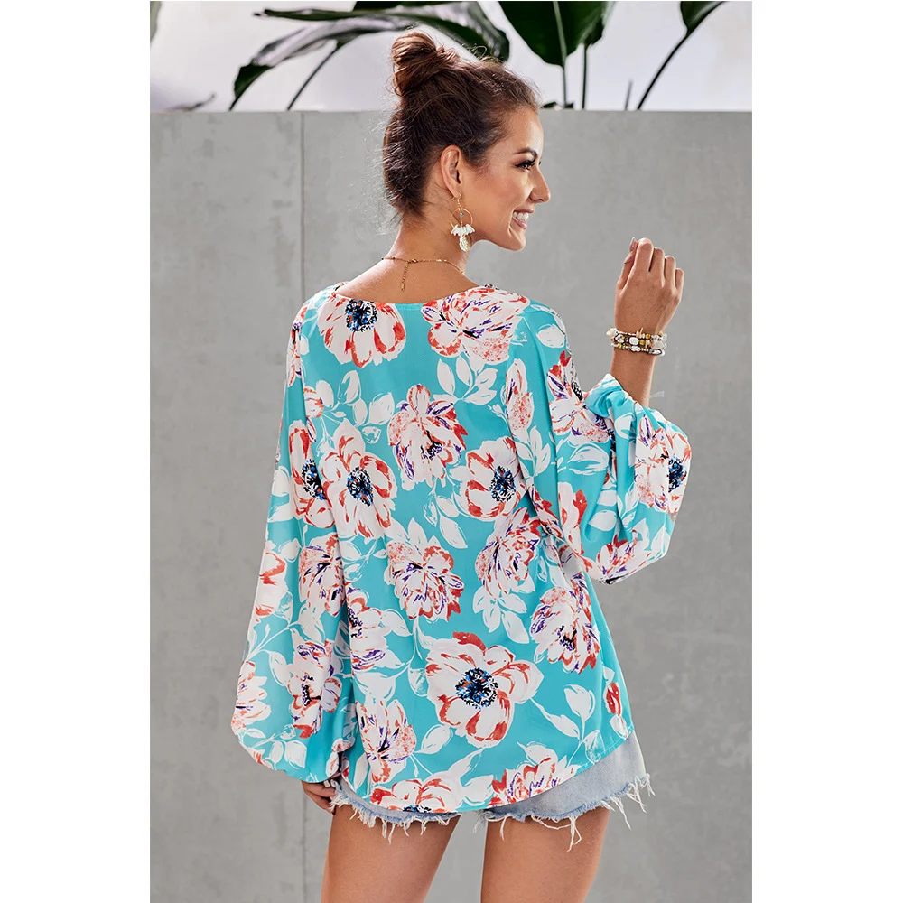 Printed loose V-neck lantern sleeve top. Enjoy effortless style and comfort with this versatile top, perfect for any cas — photo 5