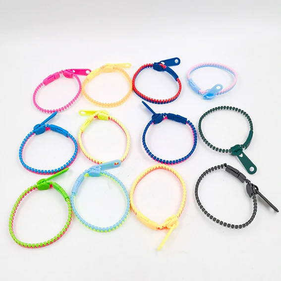 Title 2, Kinderarmband met ritssluiting, tweekleurig en ...