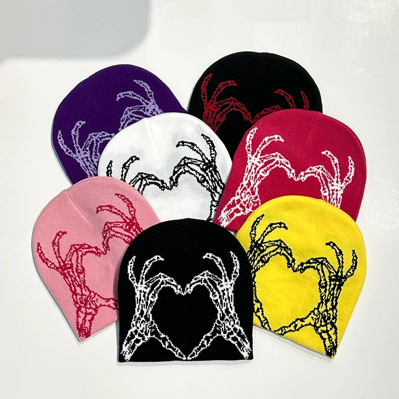 Title 5, Hand-knitted wool hat featuring a heart-shaped ...