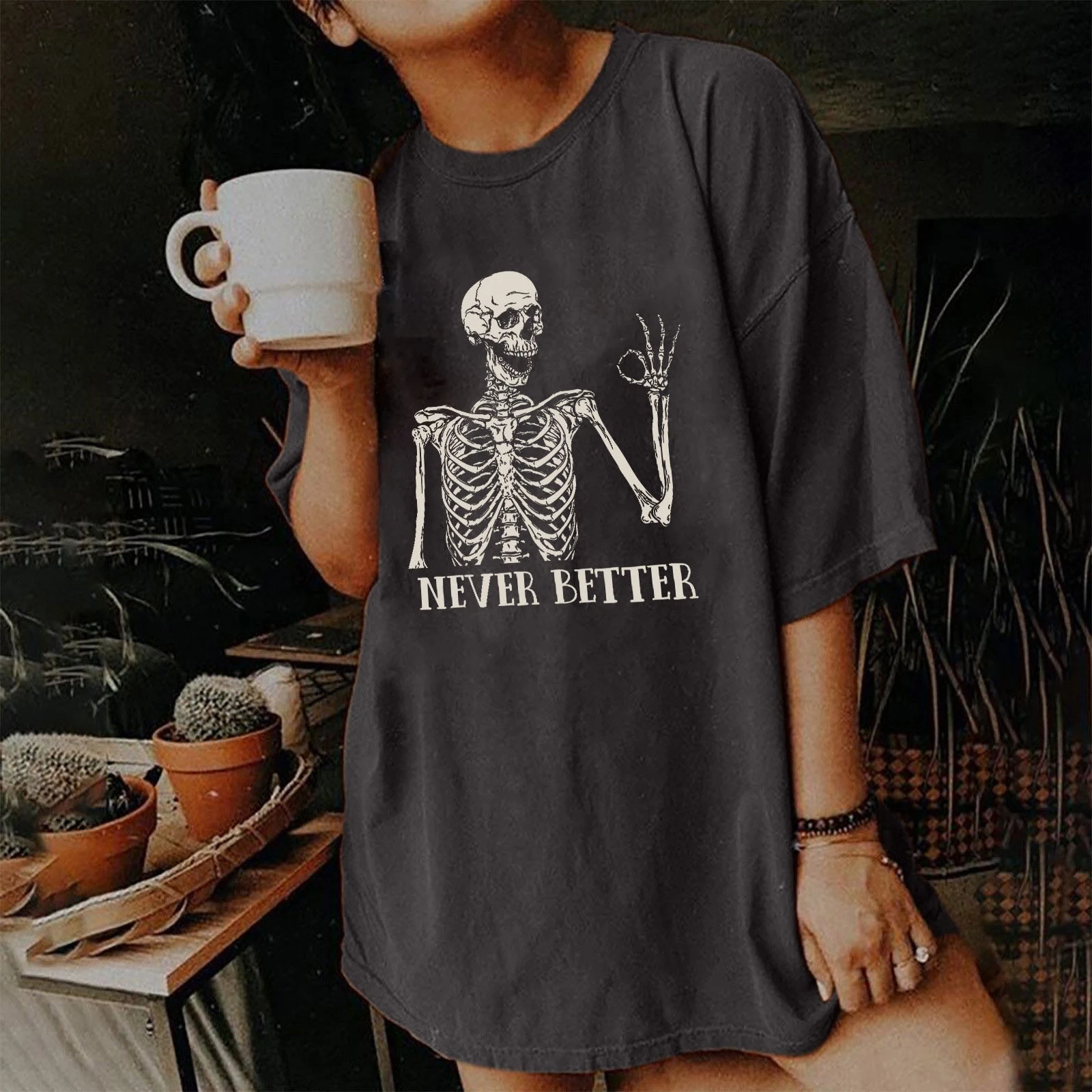 Camiseta feminina vintage de manga curta com estampa de caveira moda high street — foto 14