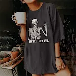 Camiseta feminina vintage de manga curta com estampa de caveira moda high street — foto 14