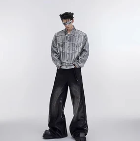Coated deconstructed wash denim jacket with old padded shoulders. A stylish, unique, and comfortable jacket for everyday — photo 1