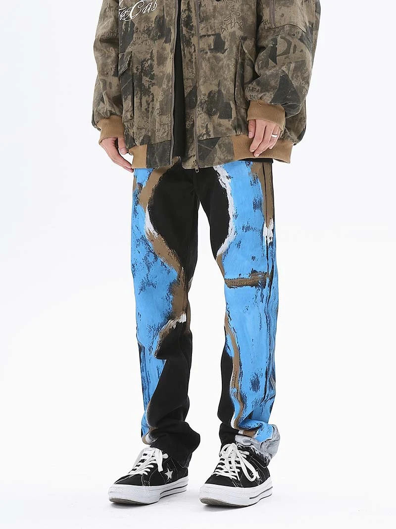 Jean homme ample graffiti avec contraste de couleurs, style décontracté et urbain, confort et design moderne, parfait pour un look tendance et branché. — photo 4