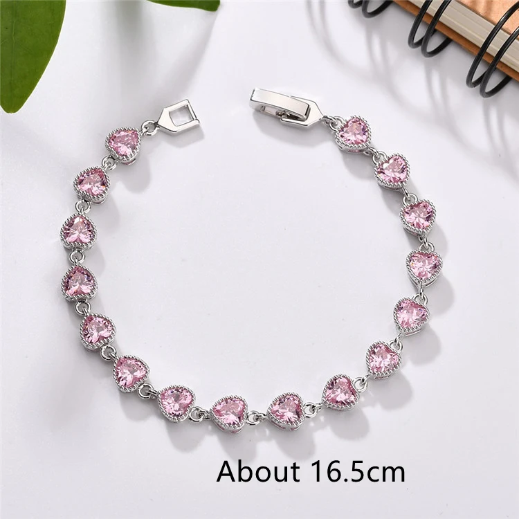 Pulseira Love com zircônias AAA e incrustações de cobre. Jóia feminina elegante e romântica, ideal para presente especial, realça sua beleza. — foto 6