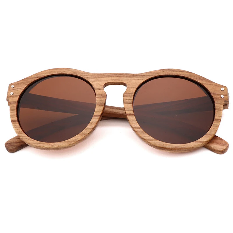 Occhiali da sole rotondi in legno di bambù polarizzati. Design elegante, protezione dai raggi solari e stile unico per un look impeccabile. — foto 1