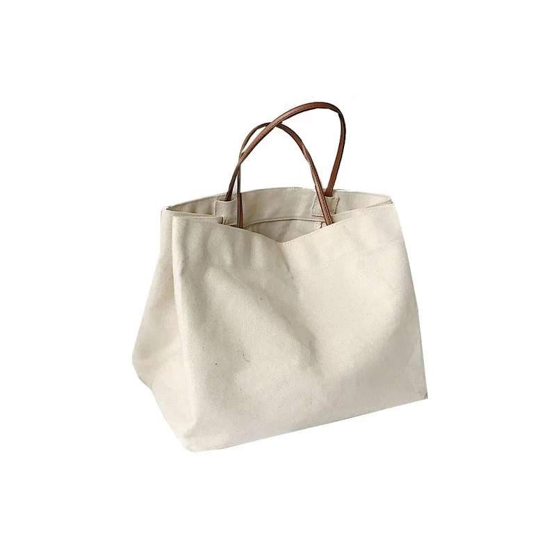 Large Capacity Simple Canvas Bag Solid Color Handbag. Offers ample storage for everyday essentials, shopping, or travel. — photo 1