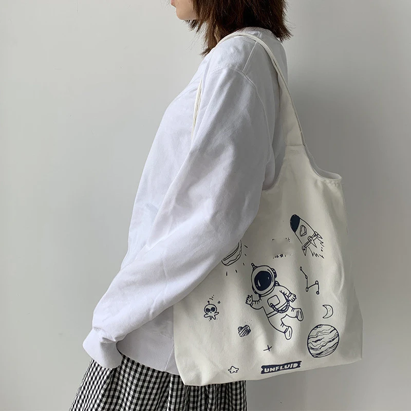 Bolsa de lona estilo colete feminina versão coreana de ombro único. Perfeita para o dia a dia, leve e espaçosa, ideal para carregar seus pertences com estilo. — foto 1