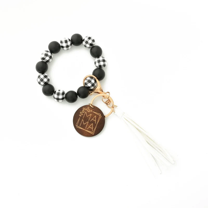 Chaveiro pulseira de borla artesanal de moda. Um acessório charmoso e funcional 2 em 1. Leve suas chaves com estilo ou use como pulseira. Perfeito! — foto 5