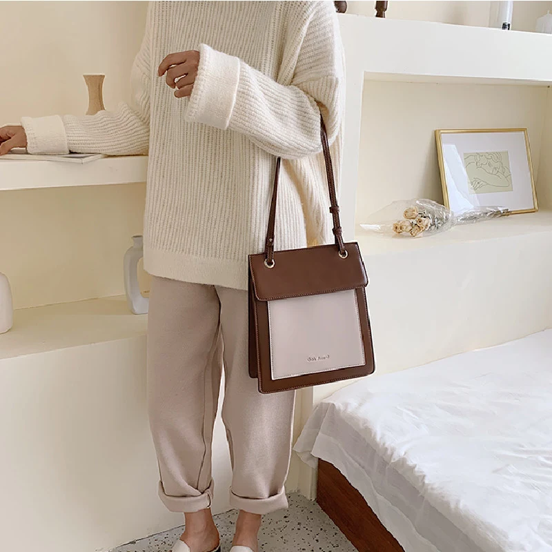 Bolsa de ombro retrô de grande capacidade com contraste de cores fashion, perfeita para carregar tudo com estilo e praticidade no dia a dia. — foto 3