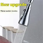 Robinet de cuisine universel avec douchette extractible et sortie d'eau, offrant flexibilité et confort pour toutes vos tâches ménagères. — photo 1