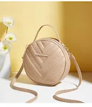 Bolsa Redonda Pequena Retrô com Relevo Coreano Texturizado. Acessório elegante e compacto, ideal para carregar o essencial com estilo e um toque retrô. Perfeita para o dia a dia. — foto 7