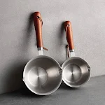 Pentola antischizzo in acciaio inox con manico in legno, ideale per friggere e cucinare senza sporcare. Facile da usare e pulire. — foto 8