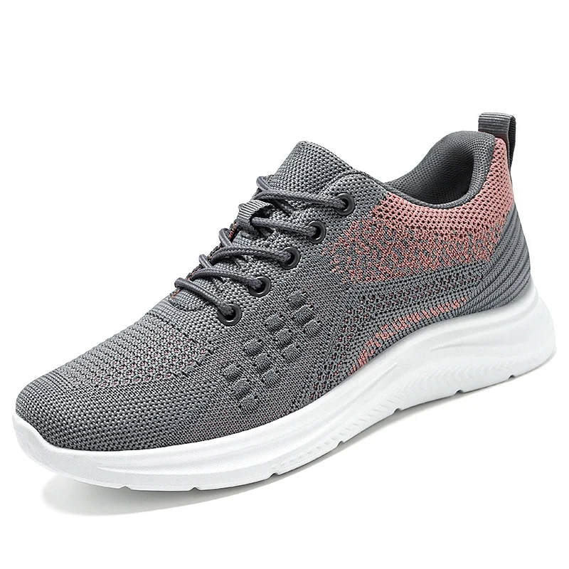 Sneakers stringate da donna, leggere e traspiranti. Scarpe basse perfette per il comfort e lo stile in ogni occasione. — foto 1