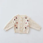Terno de duas peças com jaqueta de tricô e alças. Combine estilo e conforto com este conjunto perfeito para qualquer evento. Sinta-se confiante e chique. — foto 16