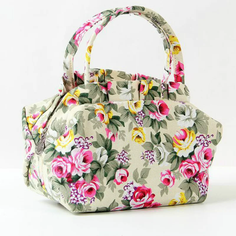 Bolsa de lona rosa com laço mini para senhoras e idosas. Leve, charmosa e ideal para uso diário com praticidade. — foto 7