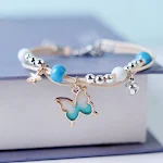 Pulseira de borboleta artística e especial, ajustável e doce. Adicione um toque delicado e charmoso ao seu visual com este acessório único. — foto 7