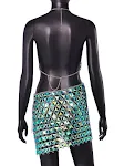 Conjunto feminino com colete halter e pedras coloridas, estiloso e atraente. Eleve seu visual com este conjunto único e moderno. — foto 4