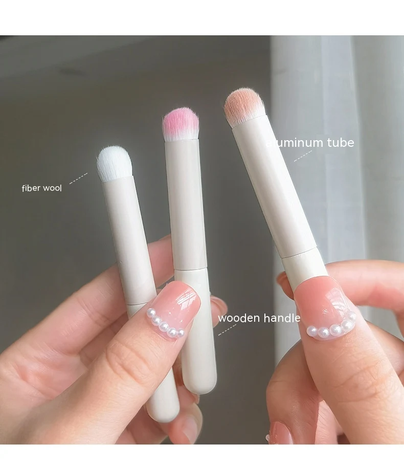 Title 6, Boxed Mini Lip Brush, a convenient round-headed...