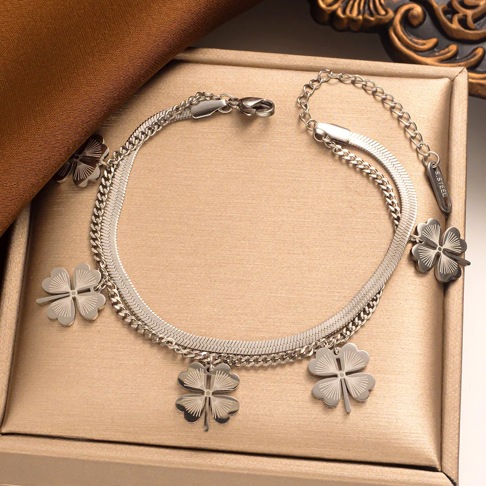Pulseira dupla camada com osso de cobra de grama de quatro folhas, amuleto da sorte e design único para homens e mulheres, estilo e proteção. — foto 5